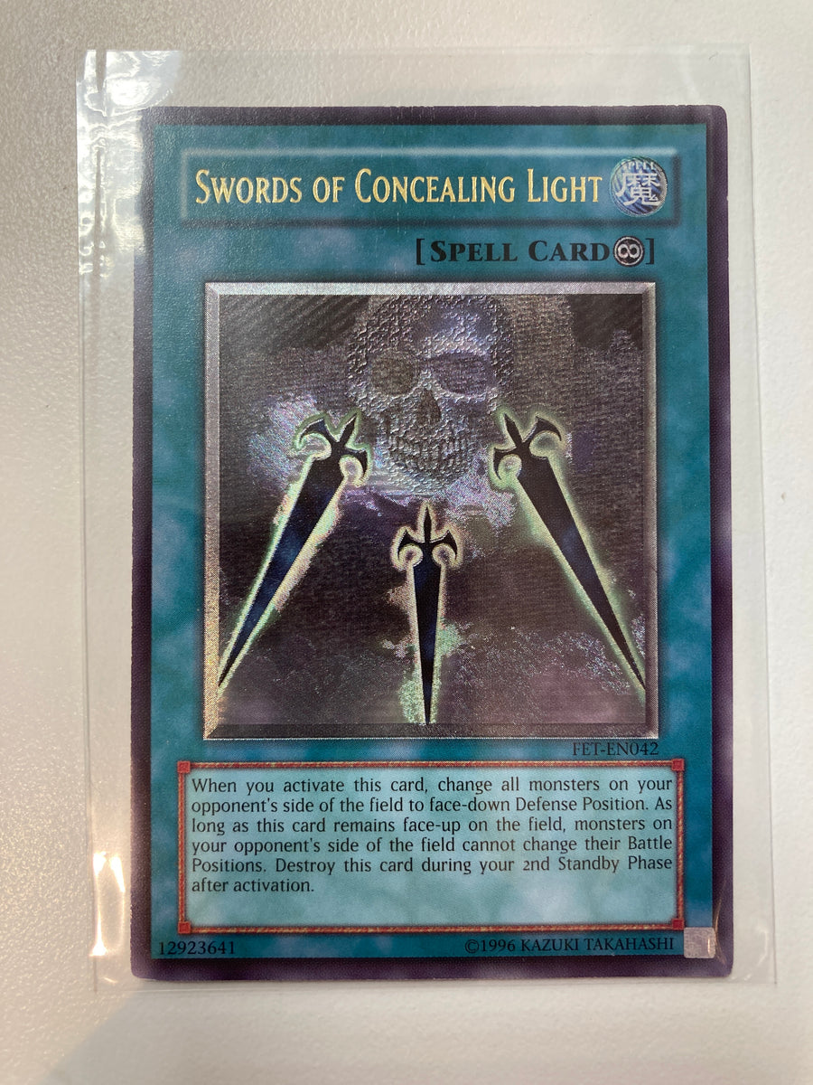 Yugioh TCG Swords of Concealing Light FET-EN042 Ultimate Rare NM