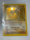 Pokémon TCG Hitmonlee 7/62 Fossil 1st Edition NM