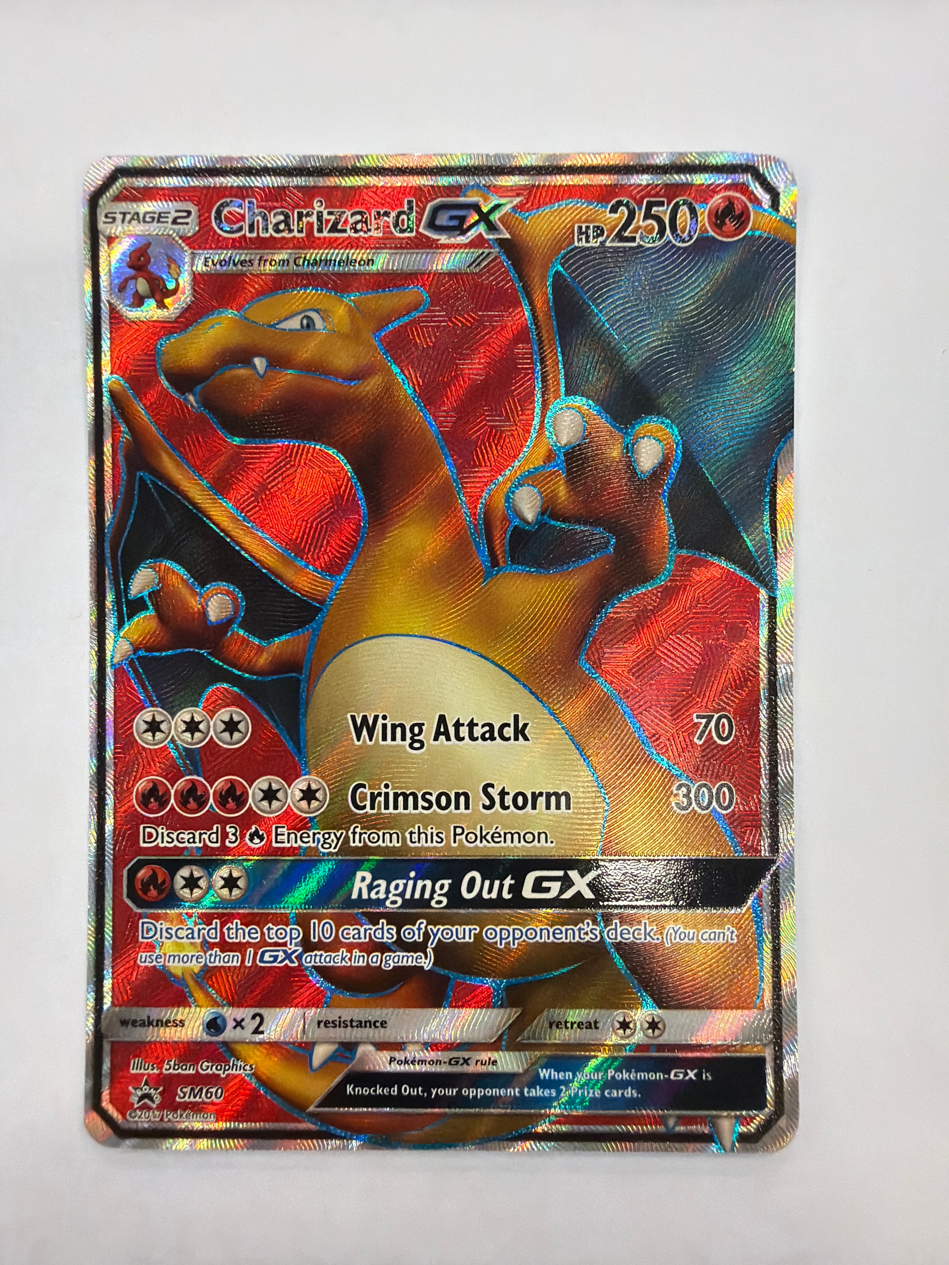 Pokémon TCG - Sun & Moon Promo Charizard GX SM60 DMG