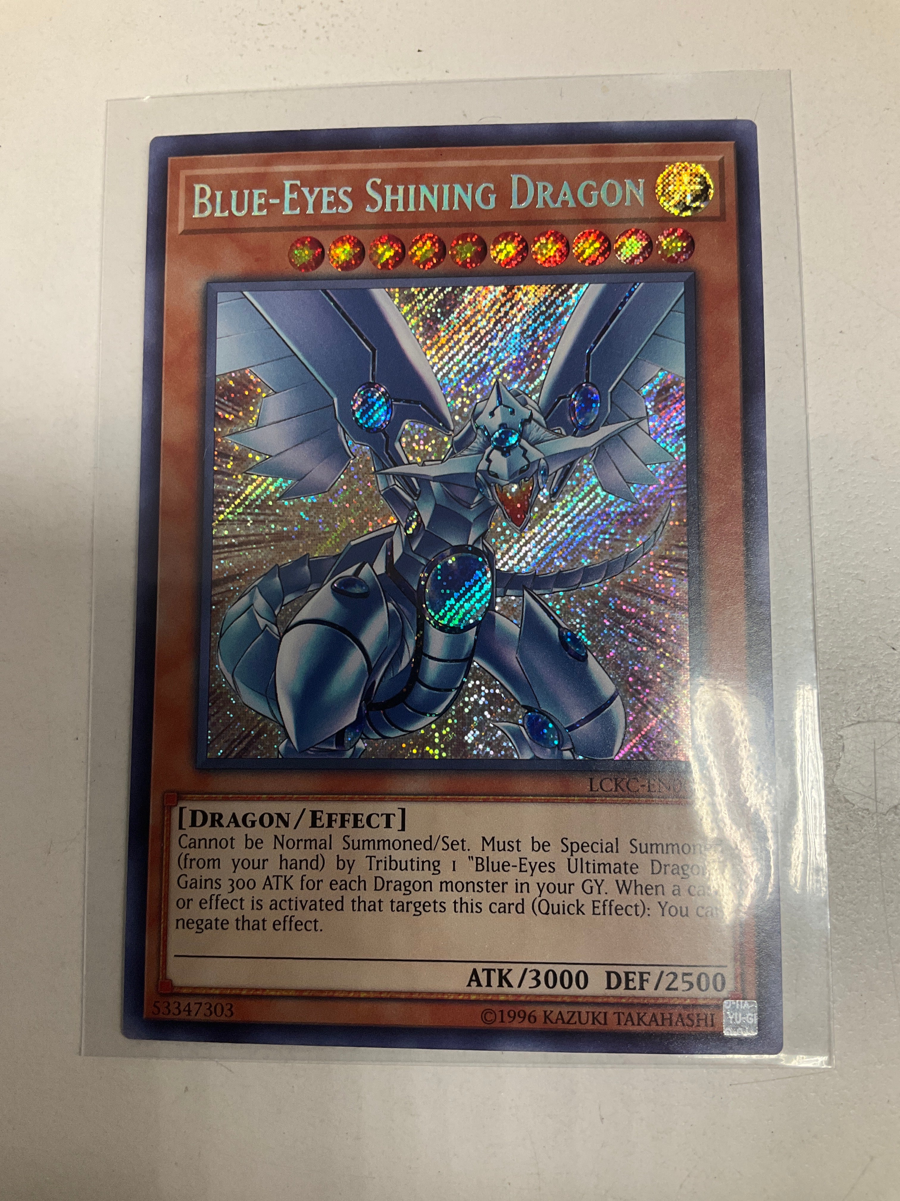 Yugioh TCG Blue-Eyes Shining Dragon LCKC-EN008 Secret Rare Unlimited M –  True Believers Gaming and Collectibles