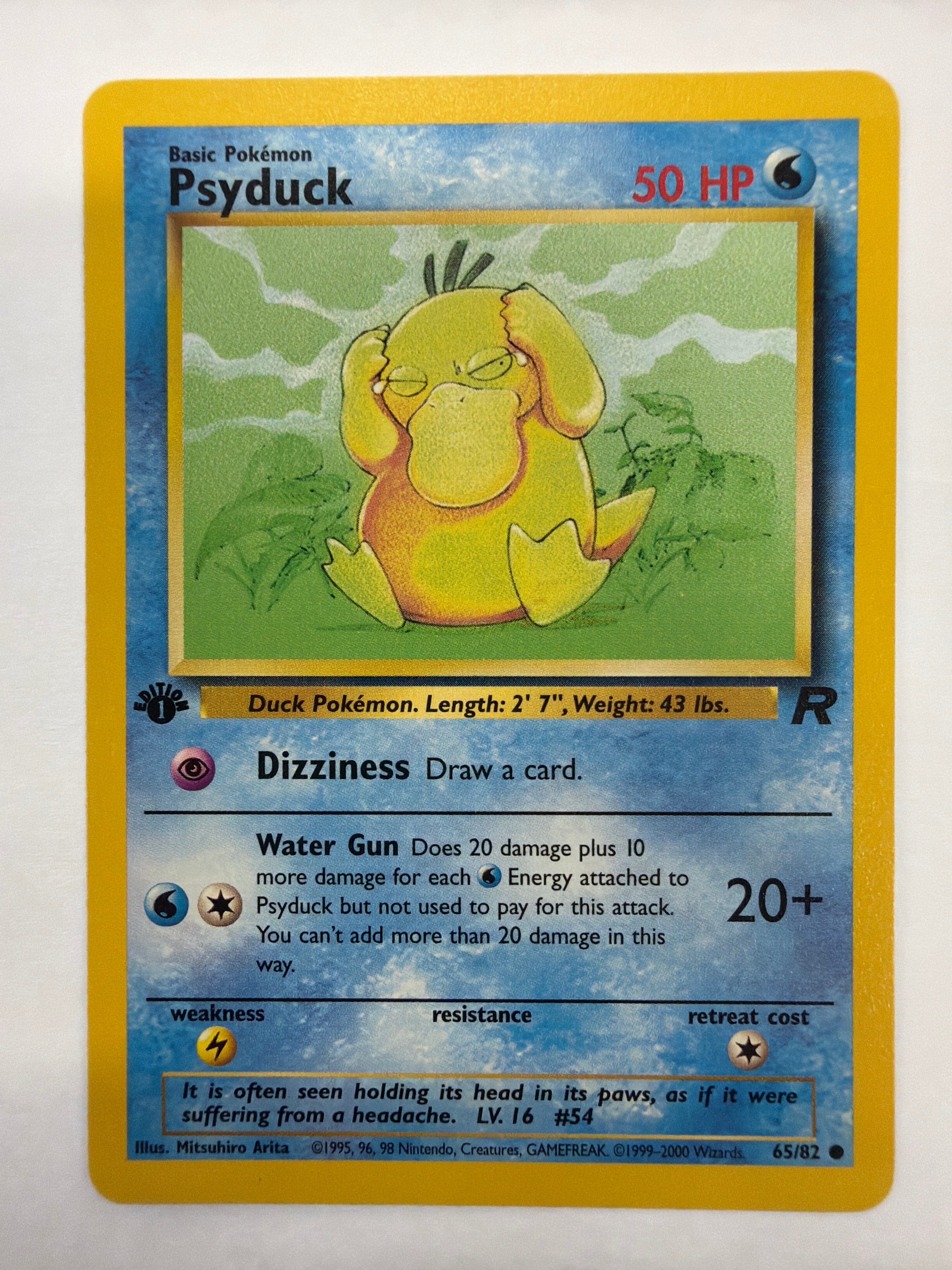 Pokémon TCG - Team Rocket 1st Edition Psyduck 65/82 Non-Holo NM