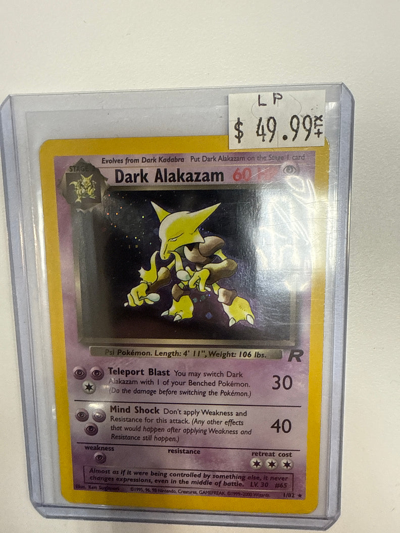 Pokemon TCG Dark Alakazam 1/82 Team Rocket Holo MP True Believers Gaming and Collectibles Pokemon TCG Dark Alakazam 1/82 Team Rocket Holo MP True Believers Gaming and Collectibles