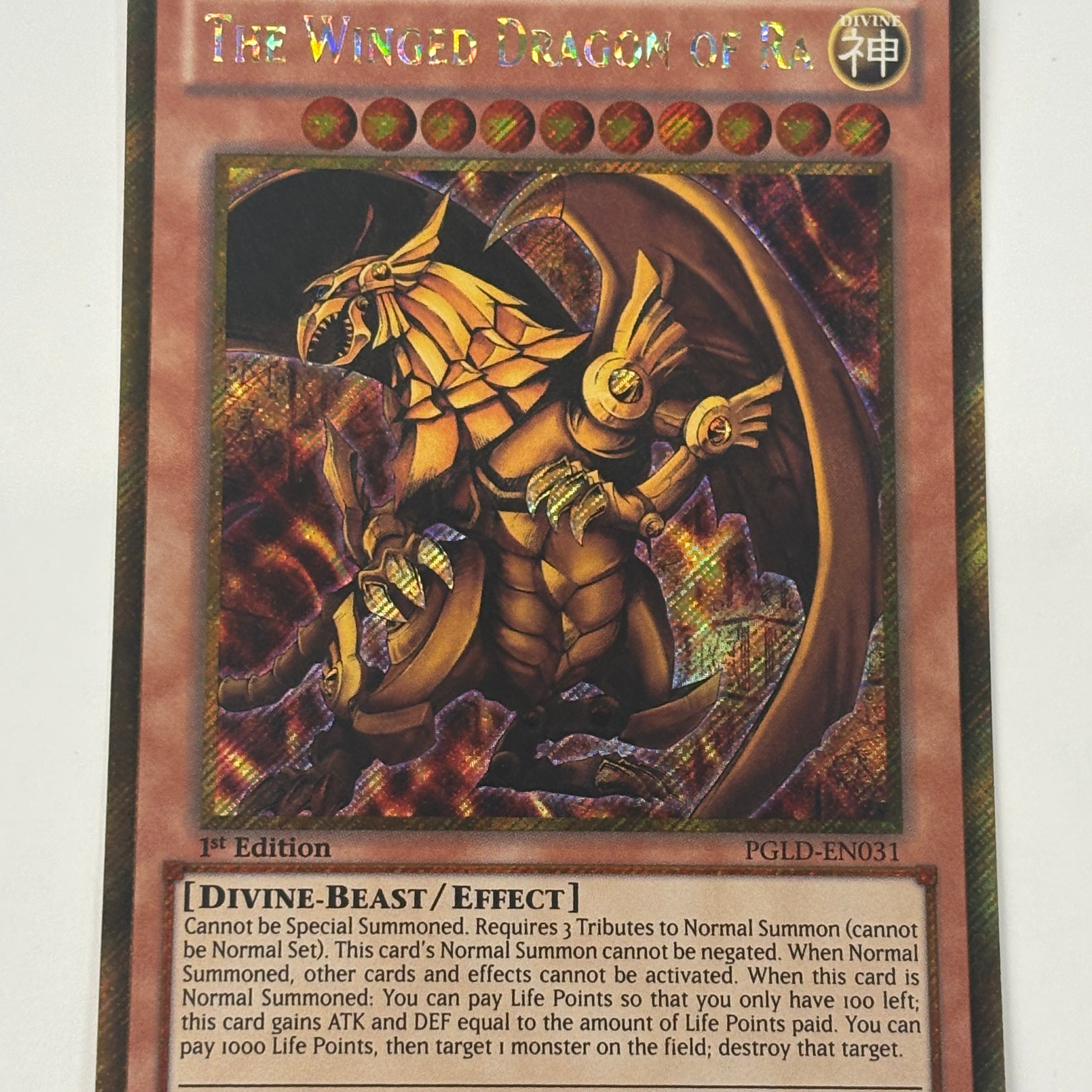 Yu-Gi-Oh! TCG - Premium Gold The Winged Dragon of Ra PGLD-EN031 Gold Secret Rare NM