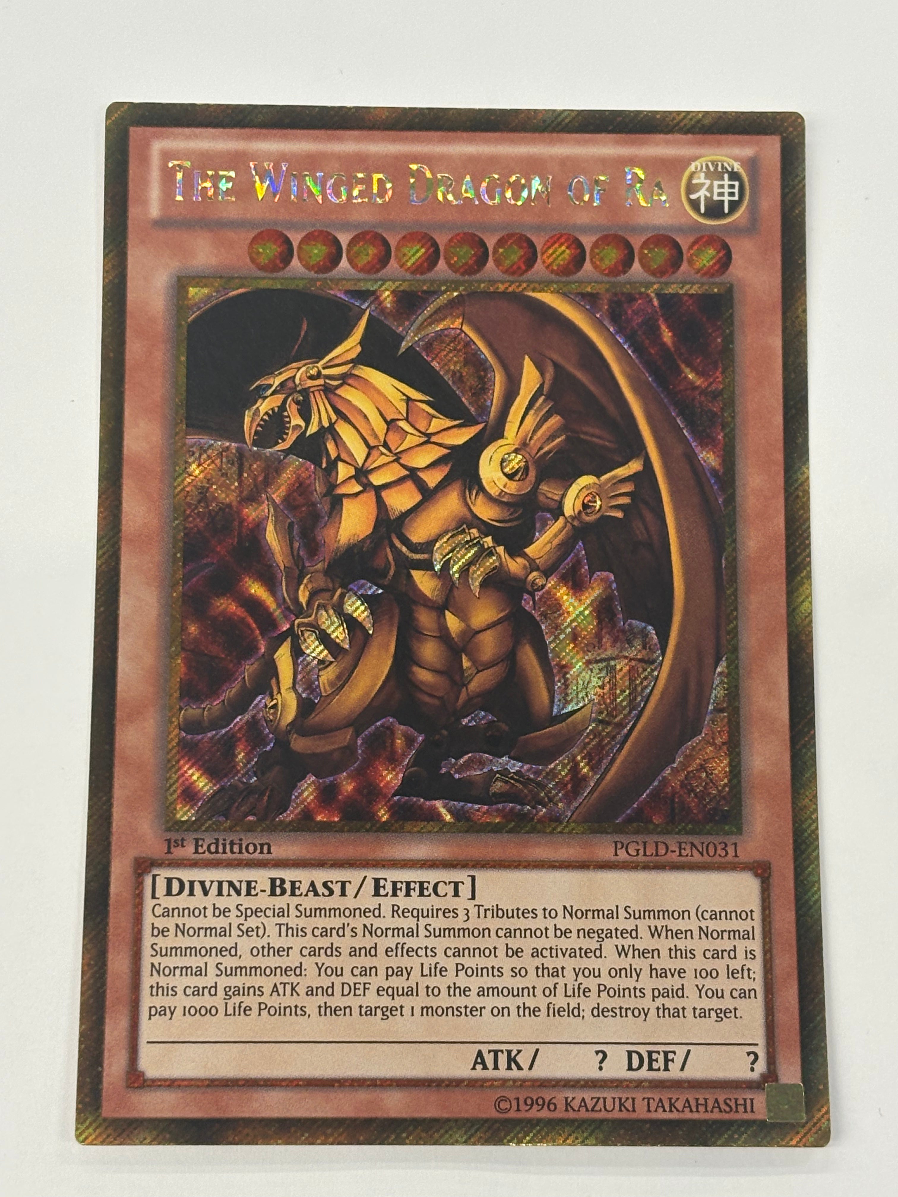 Yu-Gi-Oh! TCG - Premium Gold The Winged Dragon of Ra PGLD-EN031 Gold Secret Rare NM