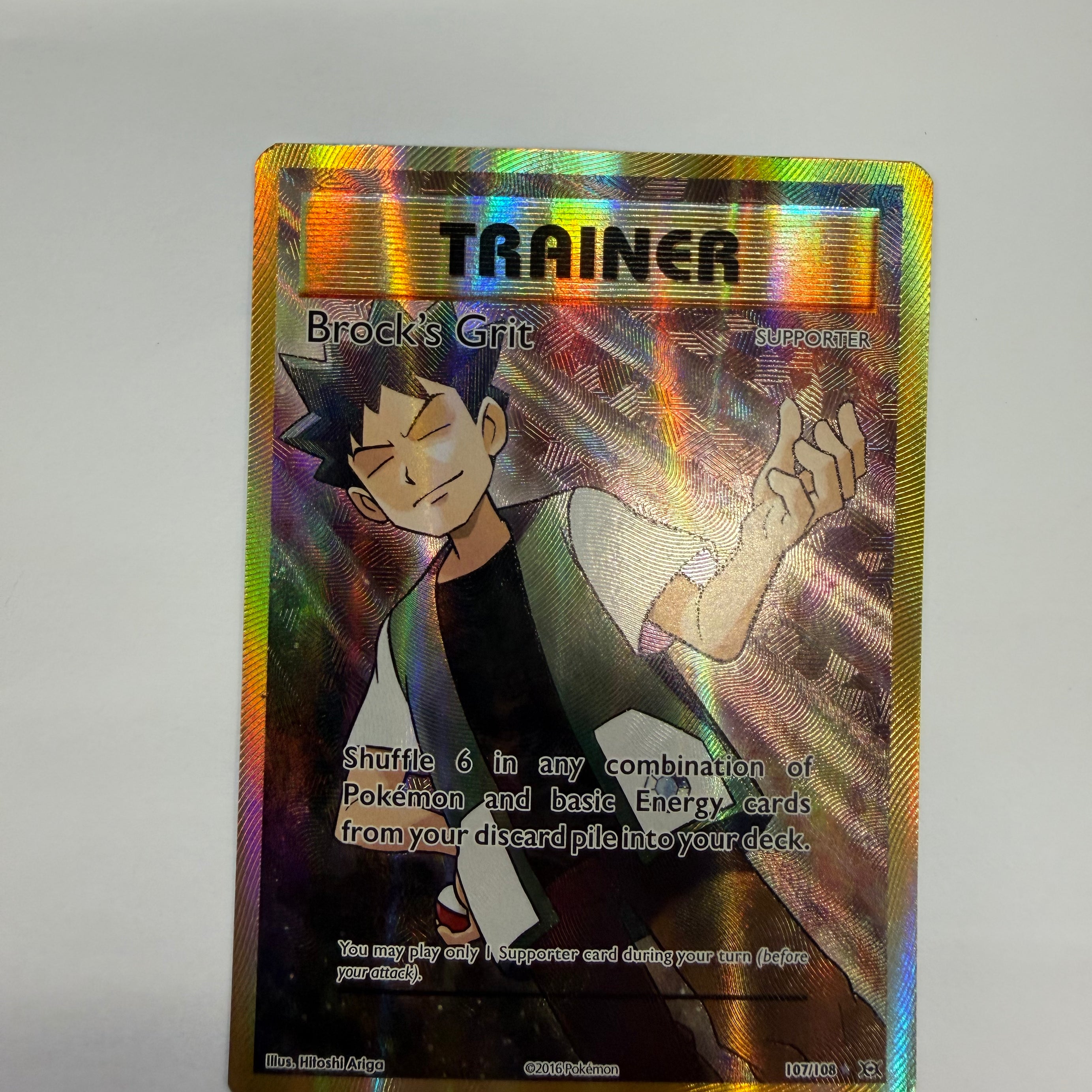 Pokémon TCG - Evolutions Brock's Grit 107/108 NM