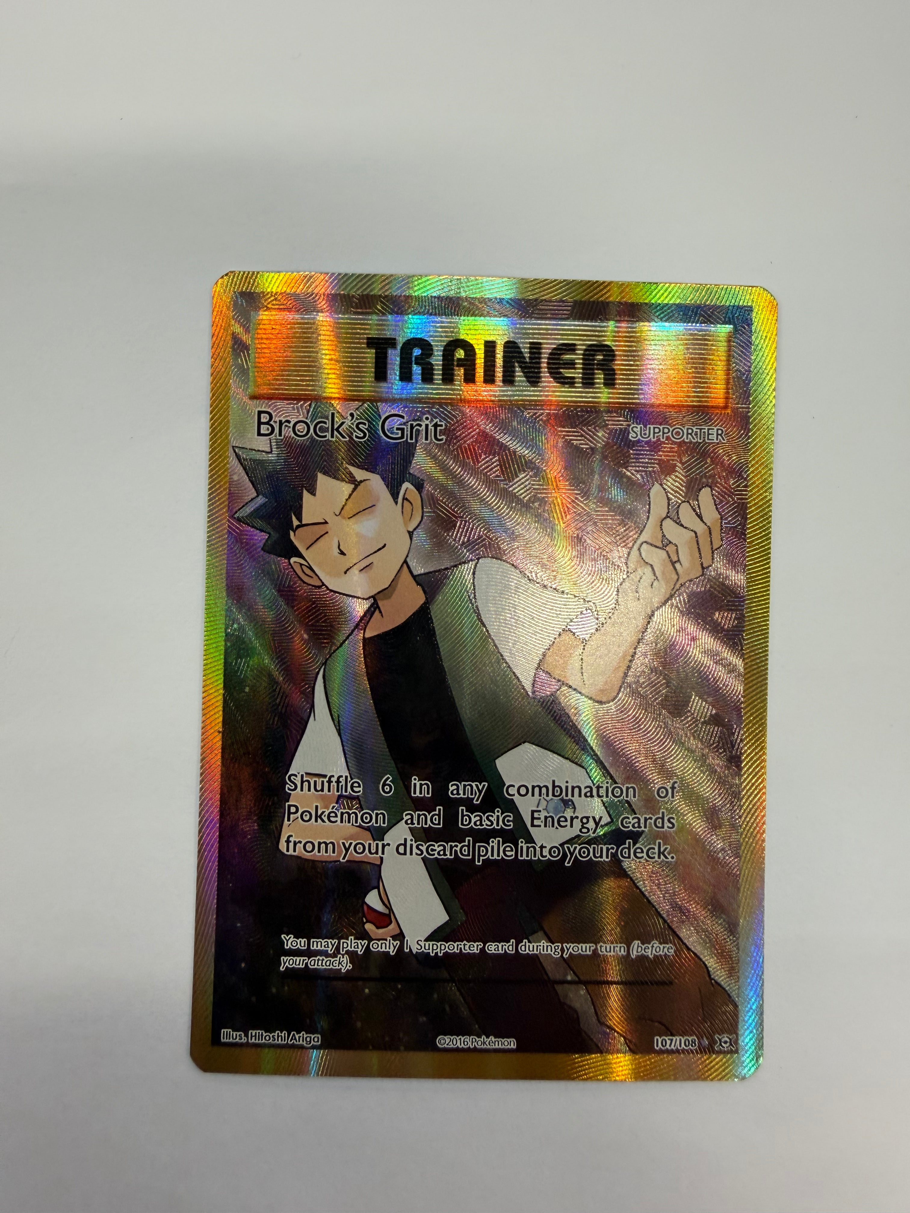 Pokémon TCG - Evolutions Brock's Grit 107/108 NM